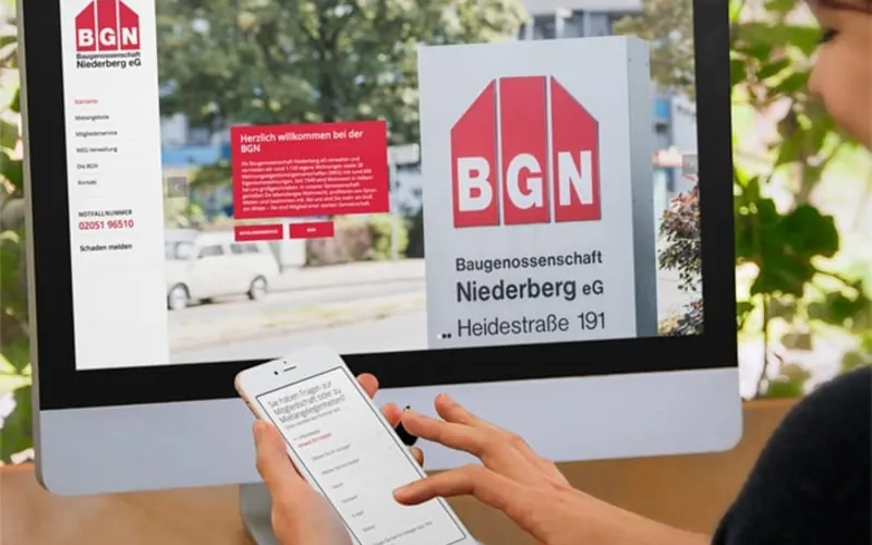 Die Webseite der BGN auf einem Bildschirm und einem Smartphone